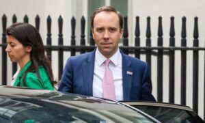 UK health minister 'very sorry' after kiss breaches COVID guidelines